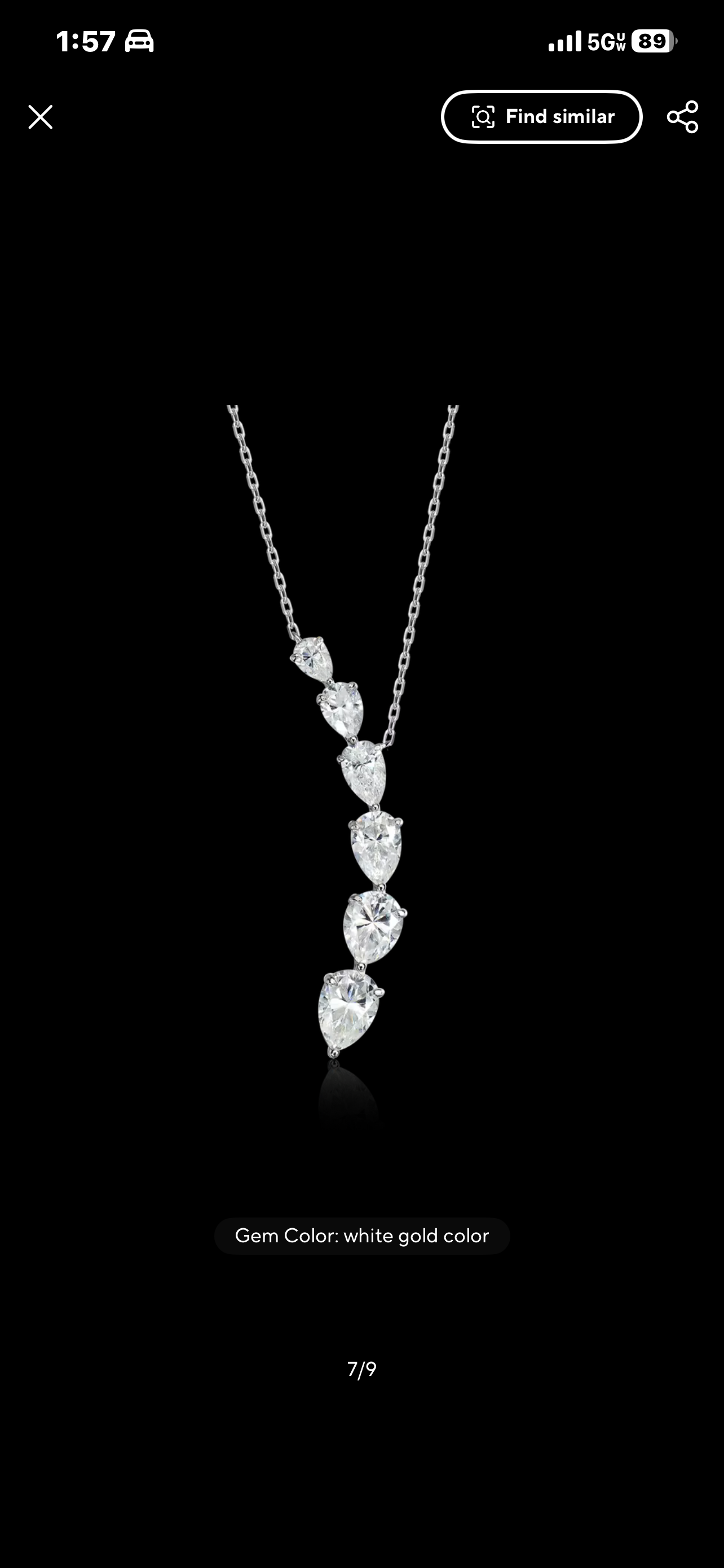 Pear-shaped moissanite curved teardrop necklace in sterling silver