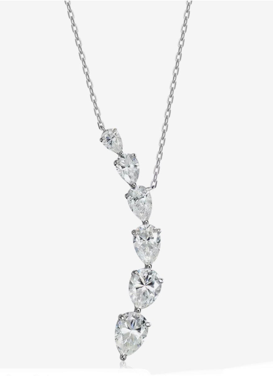 Pear-shaped moissanite curved teardrop necklace in sterling silver