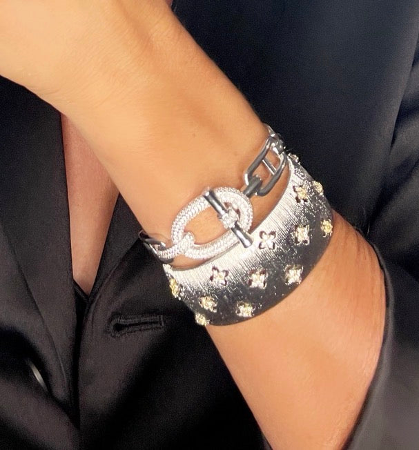 Pavé buckle bracelet worn with floral cuff
