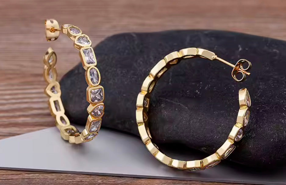 Gold multi-shaped simulated diamond hoop earrings