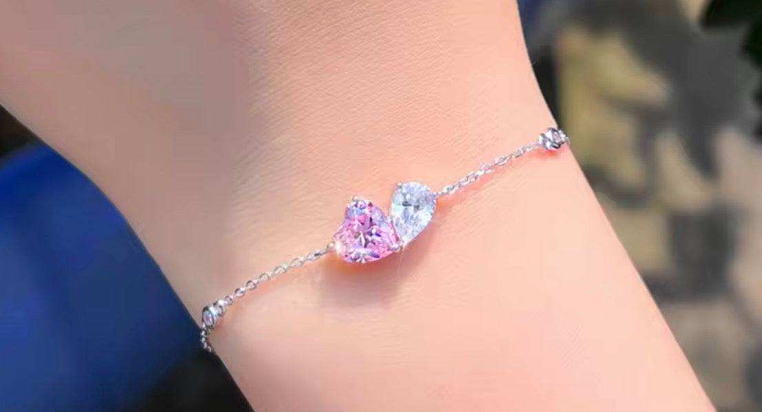 Matching pink heart and white pear simulated diamond jewelry in sterling silver