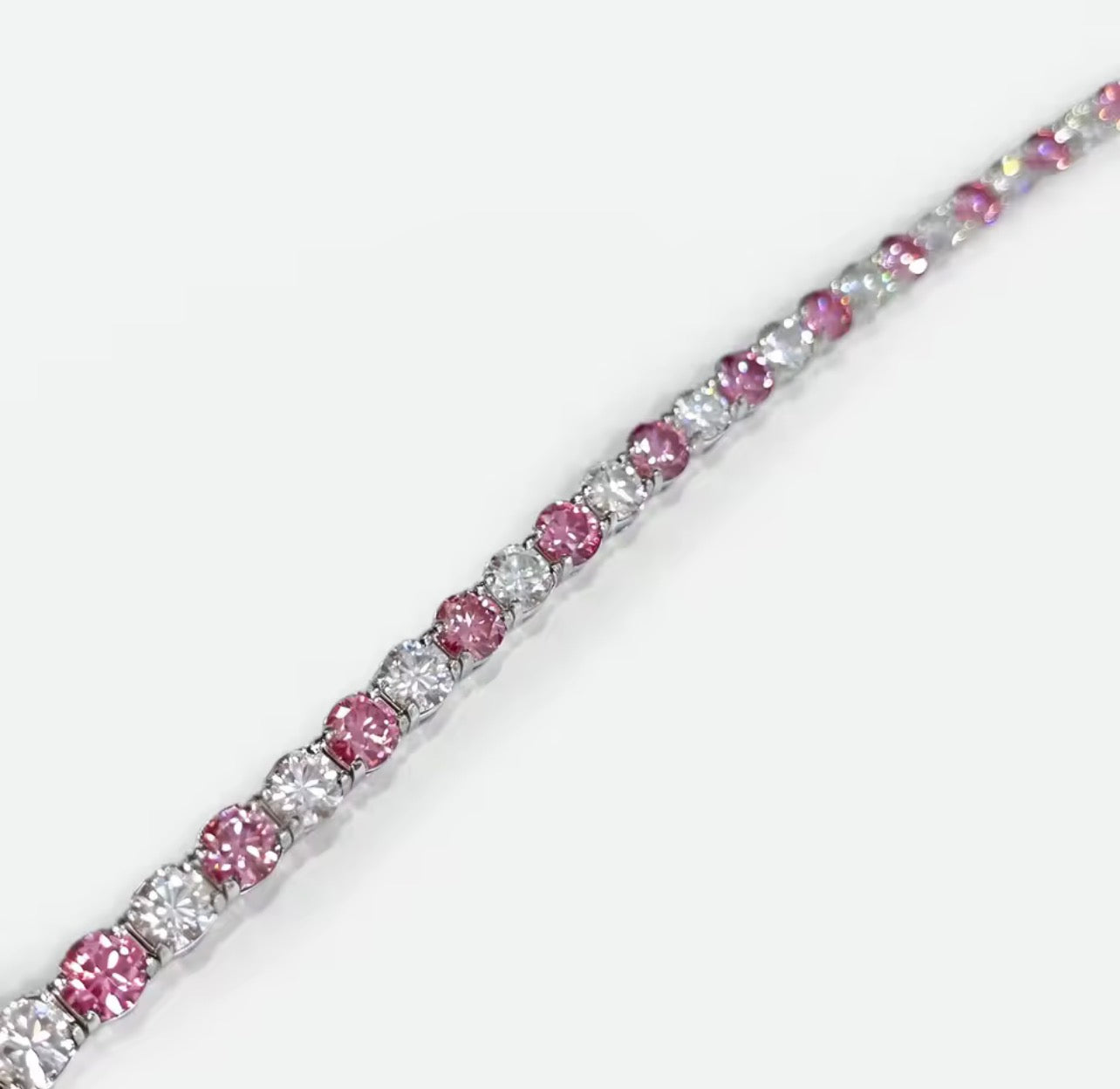 Alternating pink and white moissanite tennis bracelet