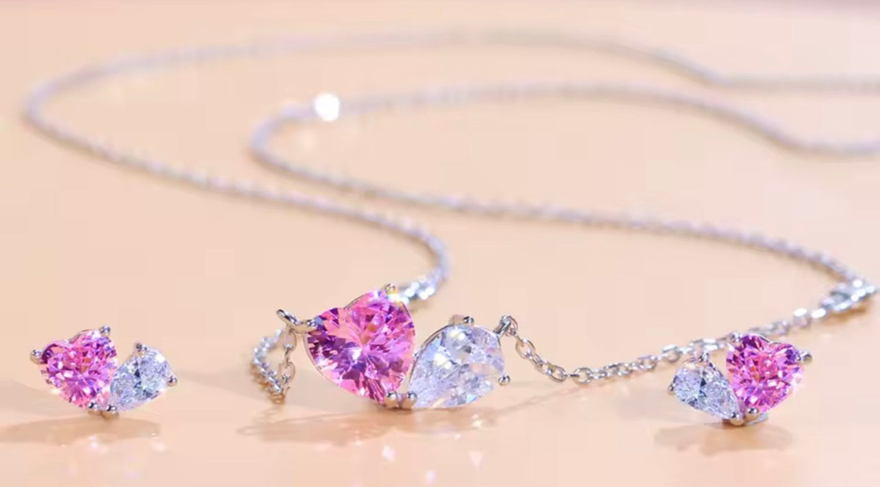 Matching pink heart and white pear simulated diamond jewelry in sterling silver