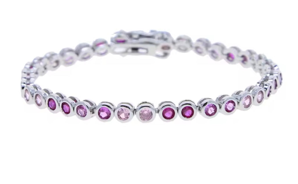 Pink bezel tennis bracelet with pink stones in silver