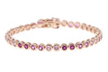 Gold bezel set pink stone tennis bracelet