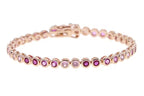 Gold bezel set pink stone tennis bracelet
