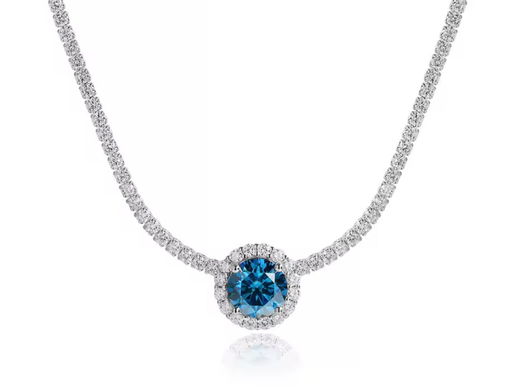 Blue sapphire halo lab moissanite tennis necklace on a white background
