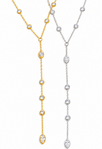 Gold and silver diamond bezel lariat necklaces on a white background