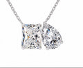 5 carat double radiant and pear cut lab moissanite pendant necklace on a white background
