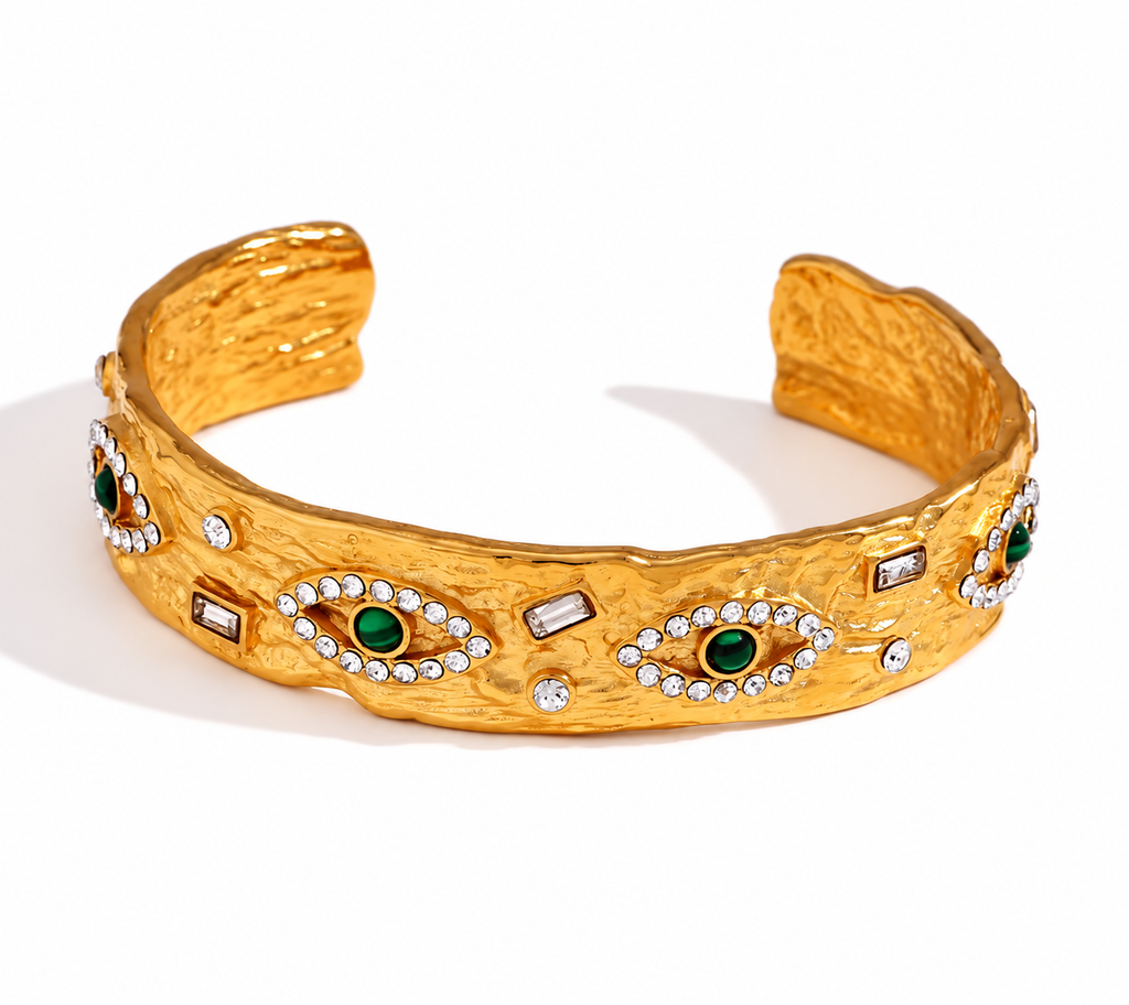 Matching gold-plated evil eye bracelet with green and clear accents