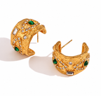Matching gold-plated evil eye earrings with green and clear accents