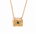 Green stone evil eye necklace with clear accents
