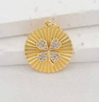 Gold clover and round four-leaf clover pendant shown together with measurements
