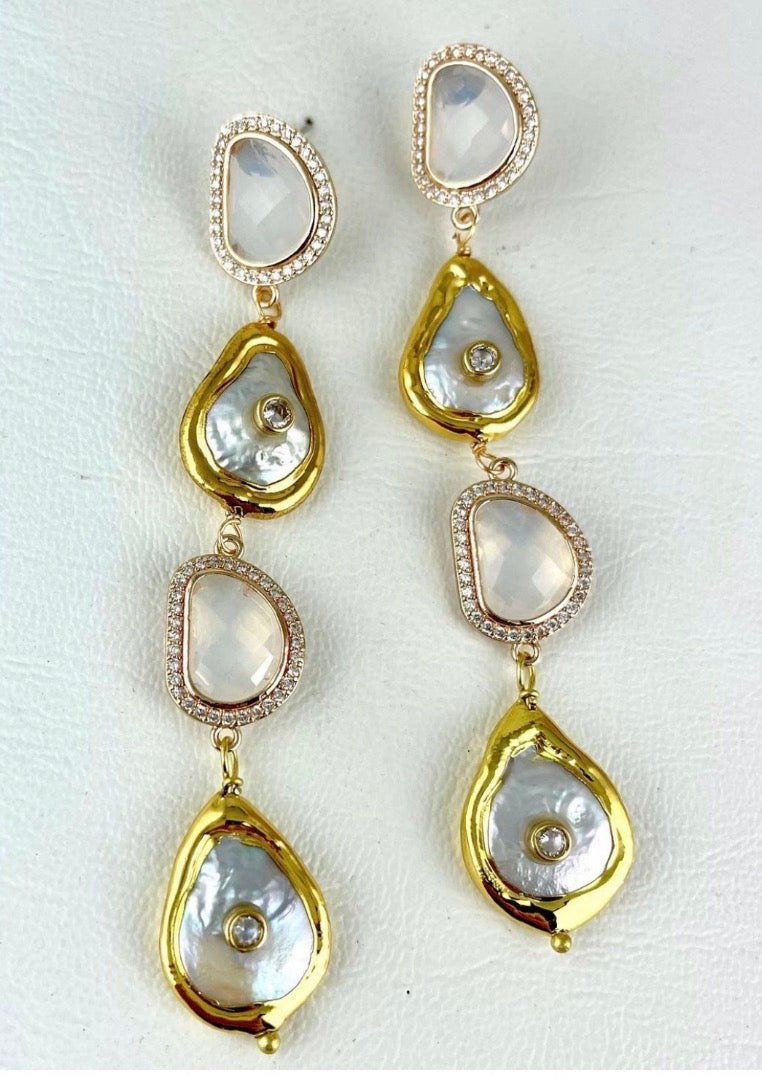 Gold dangle earrings with pearl and pavé details
