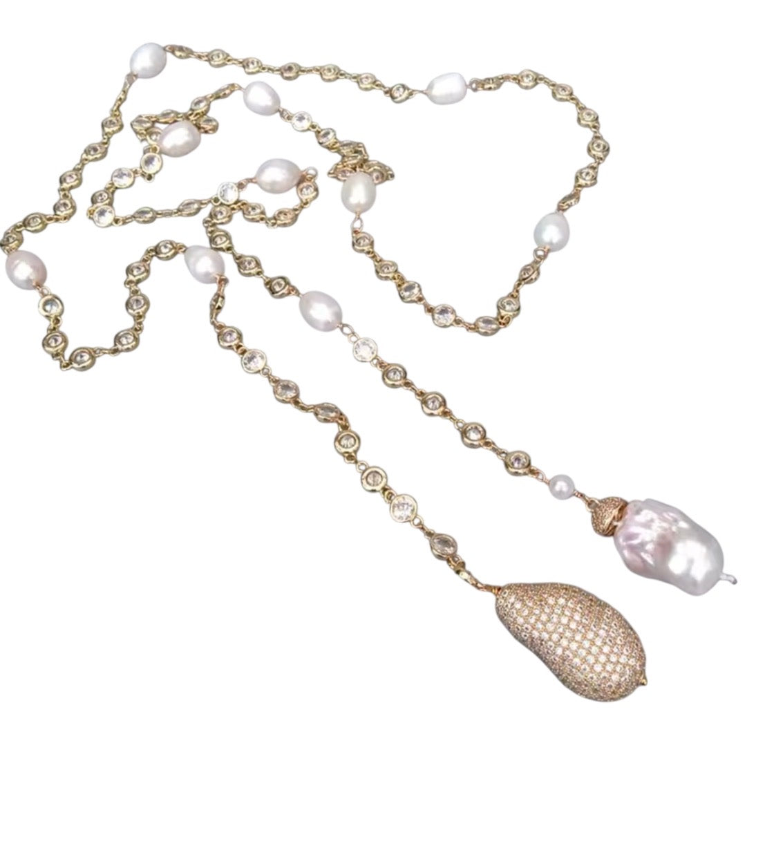 Gold and pearl wrap necklace on white background