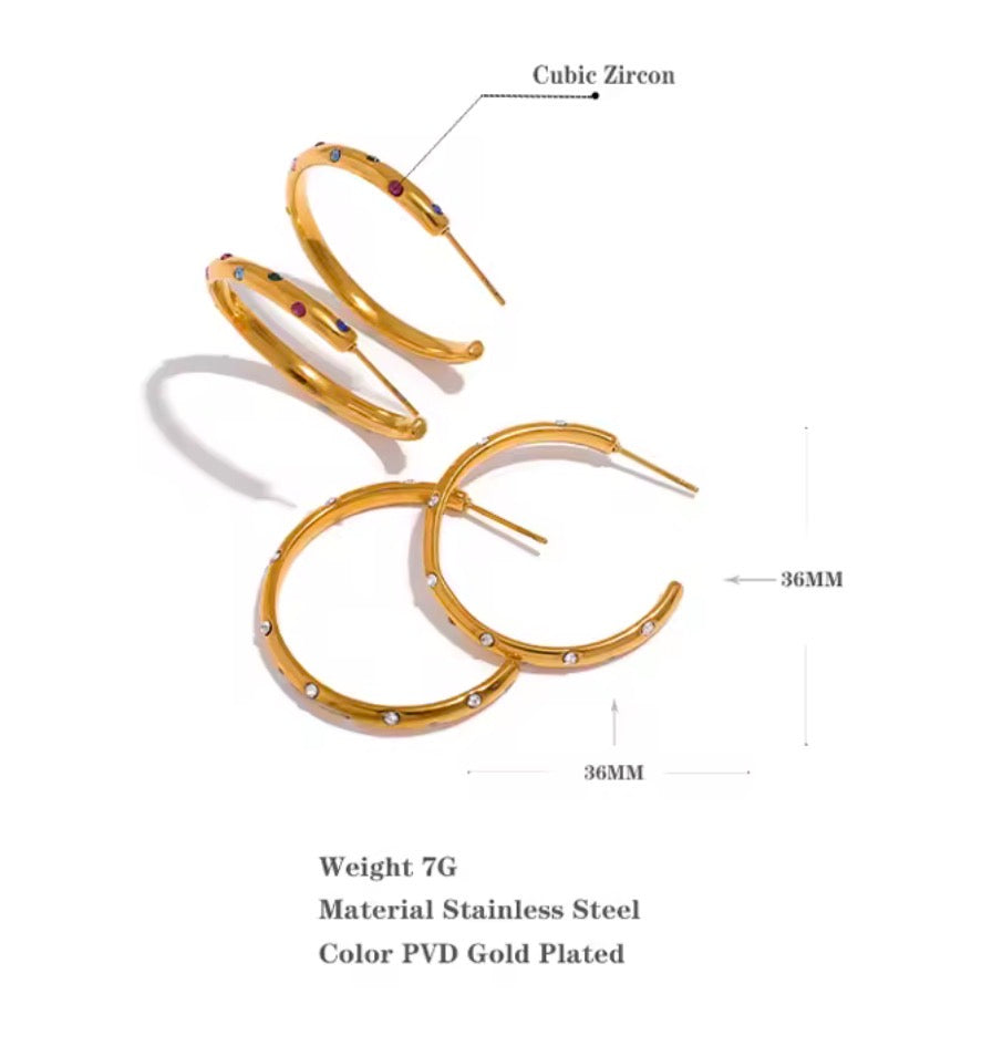 Gold hoop earrings showing size and material details