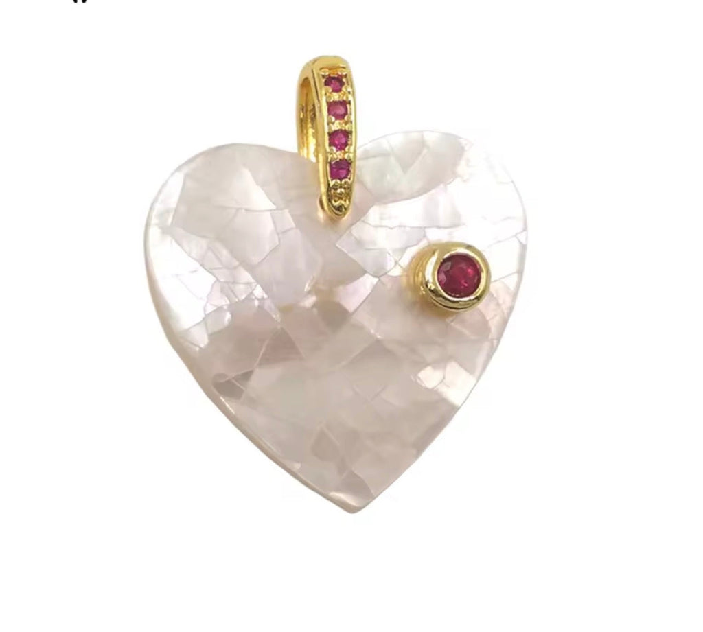 Mother of pearl heart pendant with simulated ruby accent
