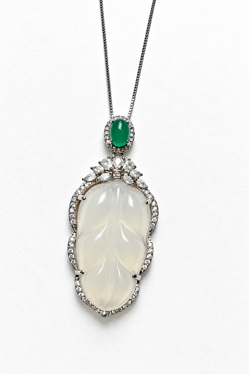 Natural chalcedony tree-leaf pendant with jade and simulated diamond accents, bright white background