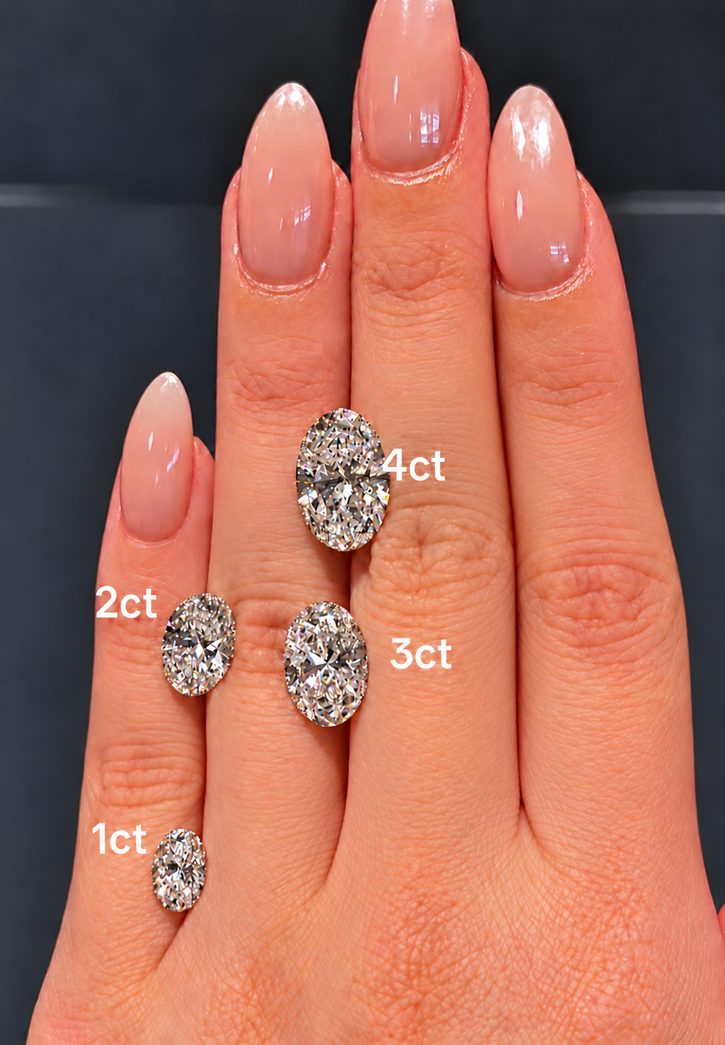 Oval lab diamond stud earrings in 1, 2, 3, and 4 carat sizes
